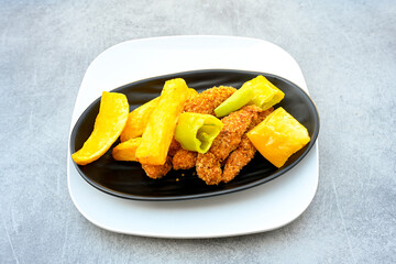 Homemade fried chicken nuggets isolated on white background. Chicken nugget. Citir tavuk. Citir, tavuk atistirma  tabagi.