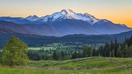 Majestic Sunrise Over Snow-Capped Mountain Range