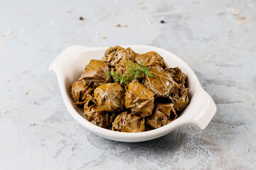 Dolma - stuffed grape leaves with rice and meat.