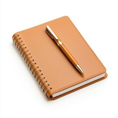A close up of a metallic pen on top and brown notebook isolated on white background for note-taking and organization.