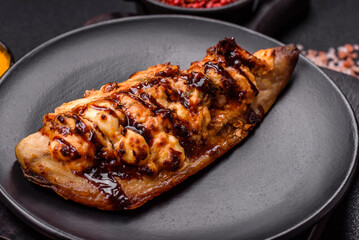 Grilled mackerel fillets with cheese, salt, spices and herbs