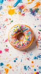 Vibrant Donut with Colorful Sprinkles on Artistic Paint Splatter Background