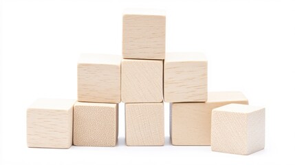 Obraz premium Wooden Building Blocks Stacked in a Creative Arrangement on White Background