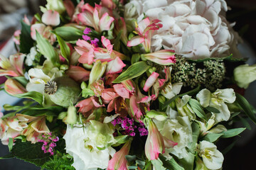 Bouquet of flowers with hydrangea, alstroemeria, poppy, eustoma and greenery