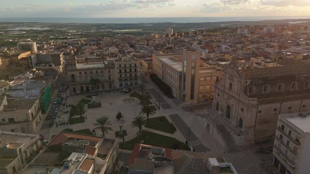 sunset flying clockwise around piazza in Ispica Sicily