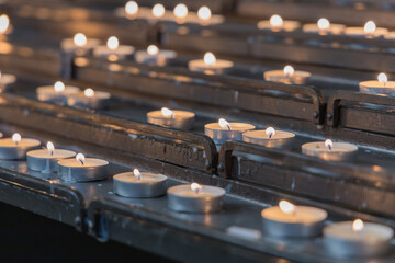 Burning candles in the church
