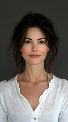 Fototapeta premium Timeless Beauty: Close-Up Portrait of a Brunette with Brown Eyes