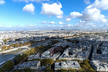 Obraz premium Aerial View of Paris highlighting the Seine River and the stunning cityscape of the metropolis