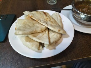 Freshly Sliced Naan Bread Perfect for Any Meal
