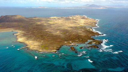 Aerial view over the coast and beaches in Lobos Island, on the Atlantic Island of Fuerteventura, Spain.