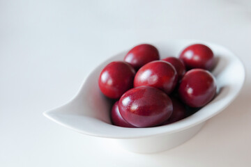 Traditional red easter eggs. Chicken eggs are painted red. High quality photo