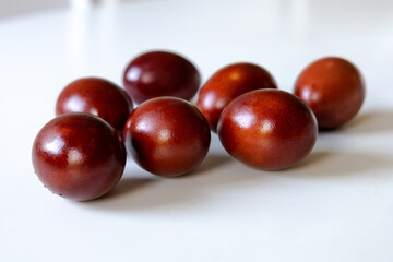 Traditional red easter eggs. Chicken eggs are painted red. High quality photo