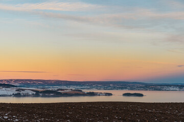 Lake Mjøsa with Helgøya and Hovinsholmen islands in December 2024.