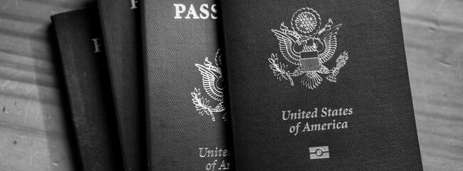 American passports on a table in black and white 