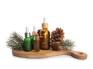 Bottles of essential oil with pine cones and fir branches on white background