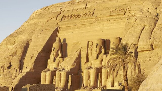 Witness the majestic Ramses II Temple Facade in Abu Simbel, Egypt. This incredible structure stands as a testament to the Pharaohs on the banks of the Nile.
