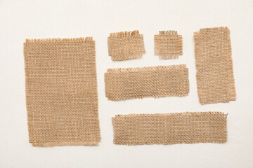 Burlap cloth pieces on white background
