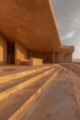 Minimalist Concrete Modern Home Exterior at Golden Hour with Geometric Design, Desert Architecture