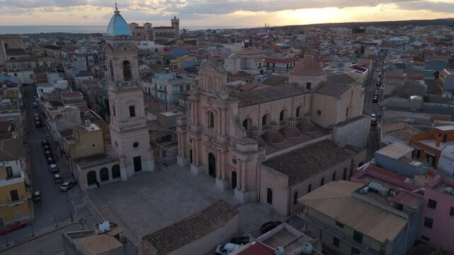 sunset flying clockwise around church in Ispica Sicily