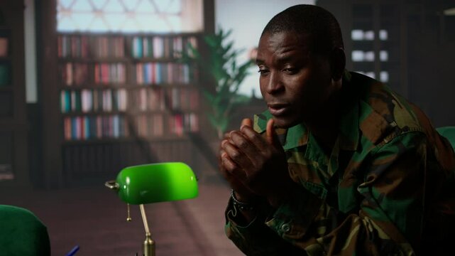 Therapist offering help to army soldier during psychotherapy session, suffering from bipolar disorder and shell shock due to war flashbacks. Distraught military personnel deals with PTSD. Camera A.