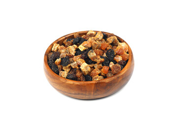 Mix of nuts and dried fruits in wooden bowl isolated on a white background.