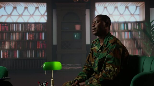 Military personnel in therapy confronting war related anxiety and psychological issues, infantry shell shock syndrome. Army soldier listening to professional advice from counselor. Camera A.