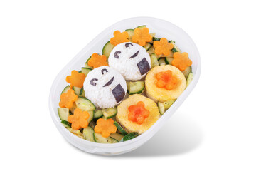 Bento box with onigiri with chicken filling and vegetables on a white isolated background