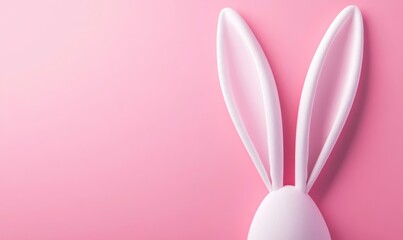 White Rabbit Ears against Pink Background. Easter concept with copy-space. .