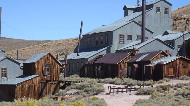 BODIE - 10.21.2024 - Exteriors of run-down industrial and residential buildings in the ghost town of Bodie, California.