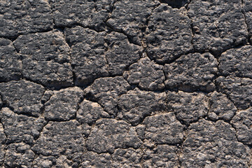 Cracked asphalt texture. Top view. Asphalt. Road background