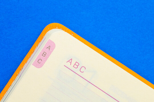 A book with the letters ABC on the front