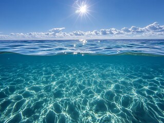Sunny ocean surface and underwater view.