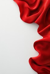 Fototapeta premium Red Satin Draped Fabric on White Background