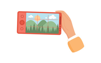 A user holds a smartphone in their hand. A hand grips a mobile phone capturing photo. The application displays camera screen on the device, flat visual style, suitable for media and technology.