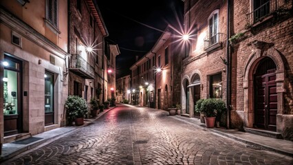 Obraz premium Deruta, Italy: Night photography captures Umbrian ceramics town's charm.