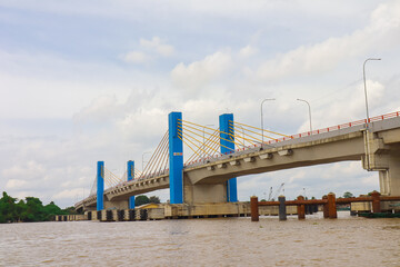 The red Ampera Bridge in Palembang City, South Sumatra, over the Musi River