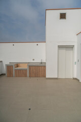 terraza con ascensor y  area de parrillas en duplex