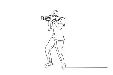 Photographer holding camera in continuous one line drawing. Single line art illustration of man hold camera. Hobby and photographer's day concept. Editable vector.