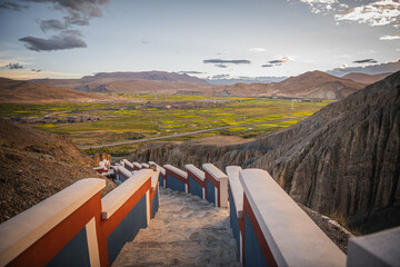 The stairs down the Sakya village in the Western Tibet during the sunset