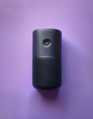 Obraz premium ラベンダーカラーの壁紙とブラックBluetoothスピーカー、控えめながら存在感のあるデザイン 