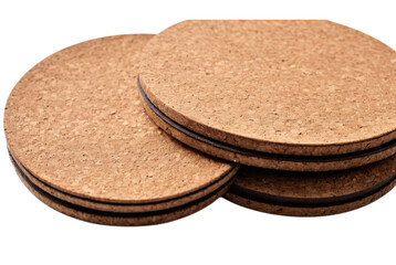 Stack of brown cork coasters in storage.png