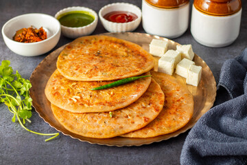 Paneer ka paratha is a soft, flavorful Indian flatbread stuffed with spiced cottage cheese, served hot with chutney or yogurt.