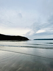 Naklejka premium Summer sunset Titahi Bay, Wellington, New Zealand