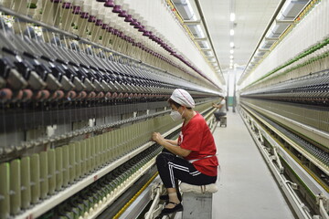 Cotton textile factory equipment is in operation