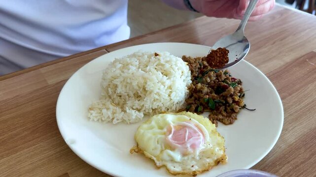 Preparing Pad Krapow in Thailand