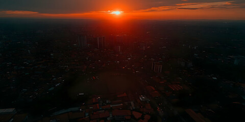 Fiery Sunset Cityscape Illustration