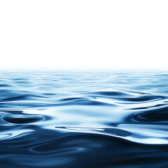 Naklejka premium Calm ocean water with gentle waves under a clear sky, ideal for relaxation and tranquility imagery.