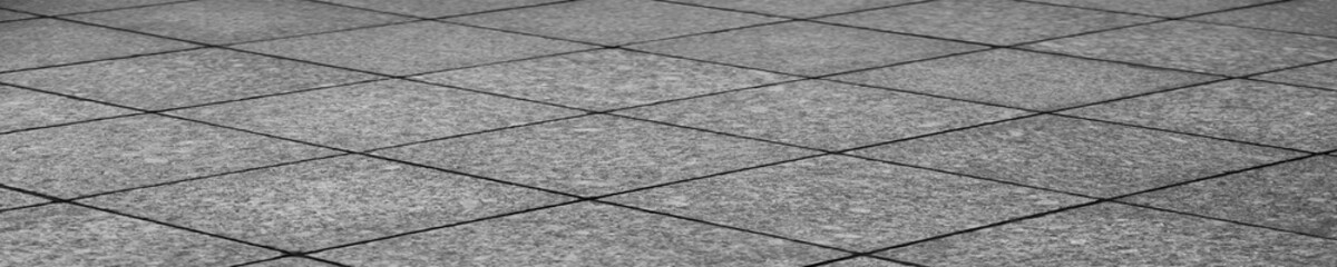 gray granite tiles floor pattern texture perspective view background. grey tiled floor backdrop....