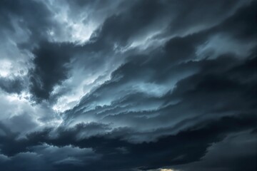 Obraz premium Ominous dark storm clouds swirling across the sky, evoking a sense of impending weather change or storm. Atmospheric and dramatic concept. Ai generative