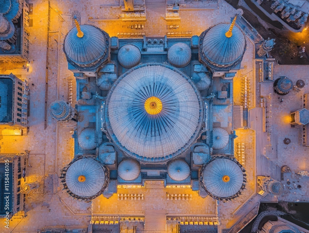 Aufkleber aerial view of a grand mosque at night, illuminated domes and intricate architecture.